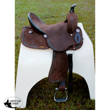 12’’ Double T Barrel style saddle with Oiled Rough out leather Teal buckstitch accents and flower conchos.