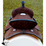 12’’ Double T Barrel style saddle with Oiled Rough out leather Teal buckstitch accents and flower conchos.