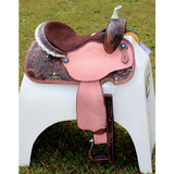 14’’ 15’’ 16’’ Double T barrel saddle with silver laced tan rawhide cantle dot border on rough out fenders and jockeys.