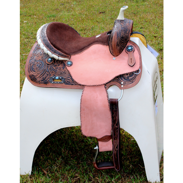 14’’ 15’’ 16’’ Double T barrel saddle with silver laced tan rawhide cantle dot border on rough out fenders and jockeys.