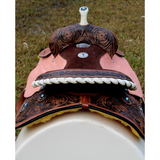 14’’ 15’’ 16’’ Double T barrel saddle with silver laced tan rawhide cantle dot border on rough out fenders and jockeys.