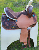 14", 15", 16" Double T barrel saddle with silver laced tan rawhide cantle, dot border on rough out fenders and jockeys. - Country Scene Saddlery and Pet Supplies