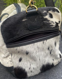 Showman ® White and Black hair on cowhide overnighter Duffle Bag. - Country Scene Saddlery and Pet Supplies