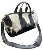 Showman ® White and Black hair on cowhide overnighter Duffle Bag. - Country Scene Saddlery and Pet Supplies