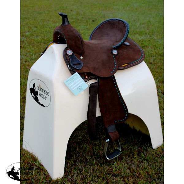 14’’ 15’’ Double T Barrel style saddle with Oiled Rough out leather Teal buckstitch accents and flower conchos.