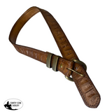 Brown leather belt with brass buckle on a white background