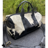 Showman ® White and Black hair on cowhide overnighter Duffle Bag. - Country Scene Saddlery and Pet Supplies
